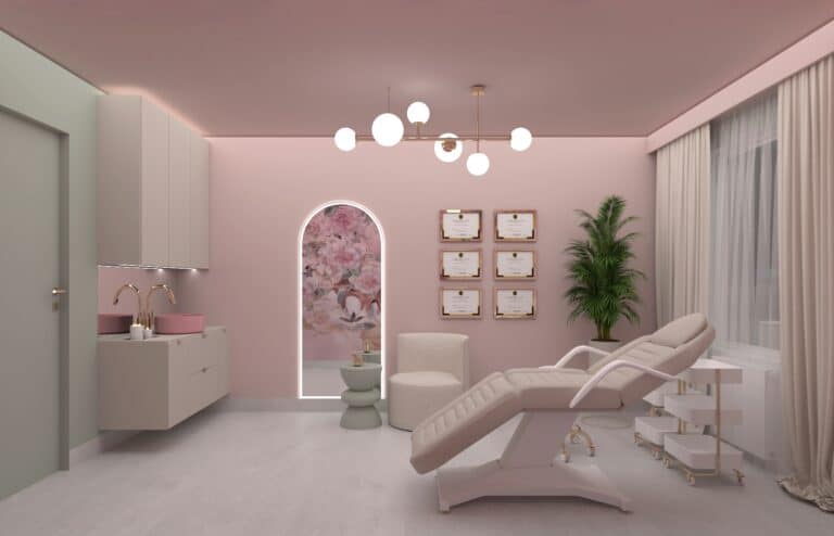 Owalne lustro z podświetleniem LED w różowym salonie kosmetycznym